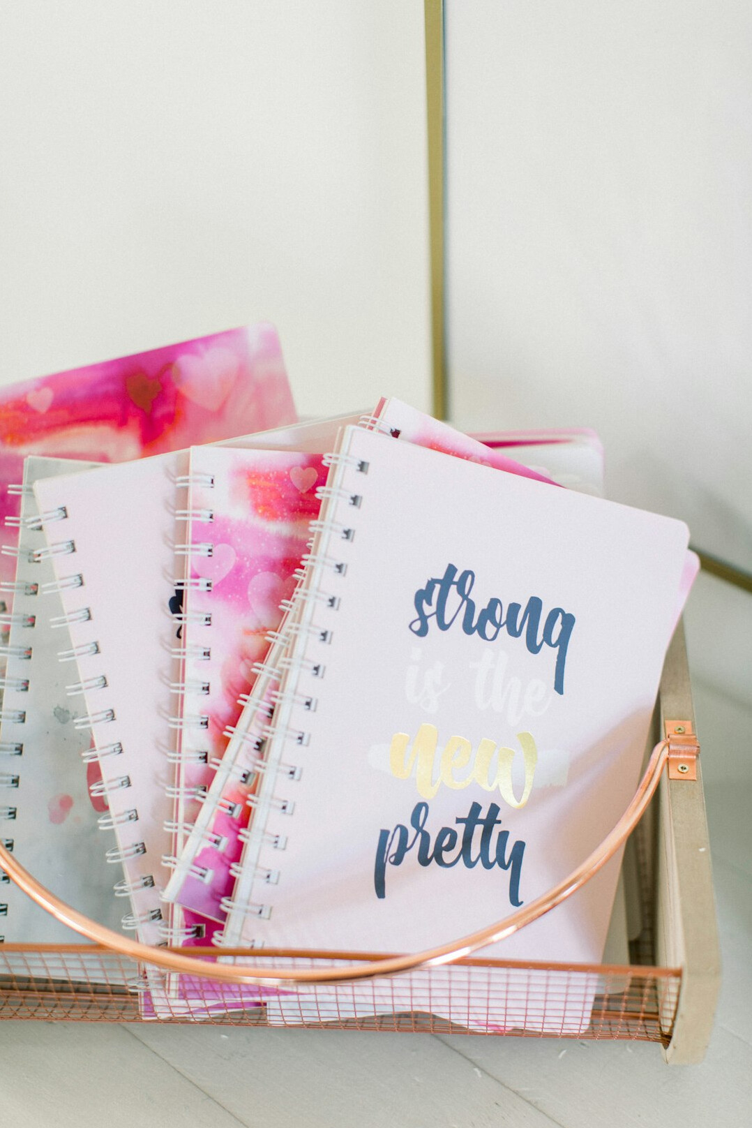 Printed weekly planner pages and monthly cleaning calendar laid on a table